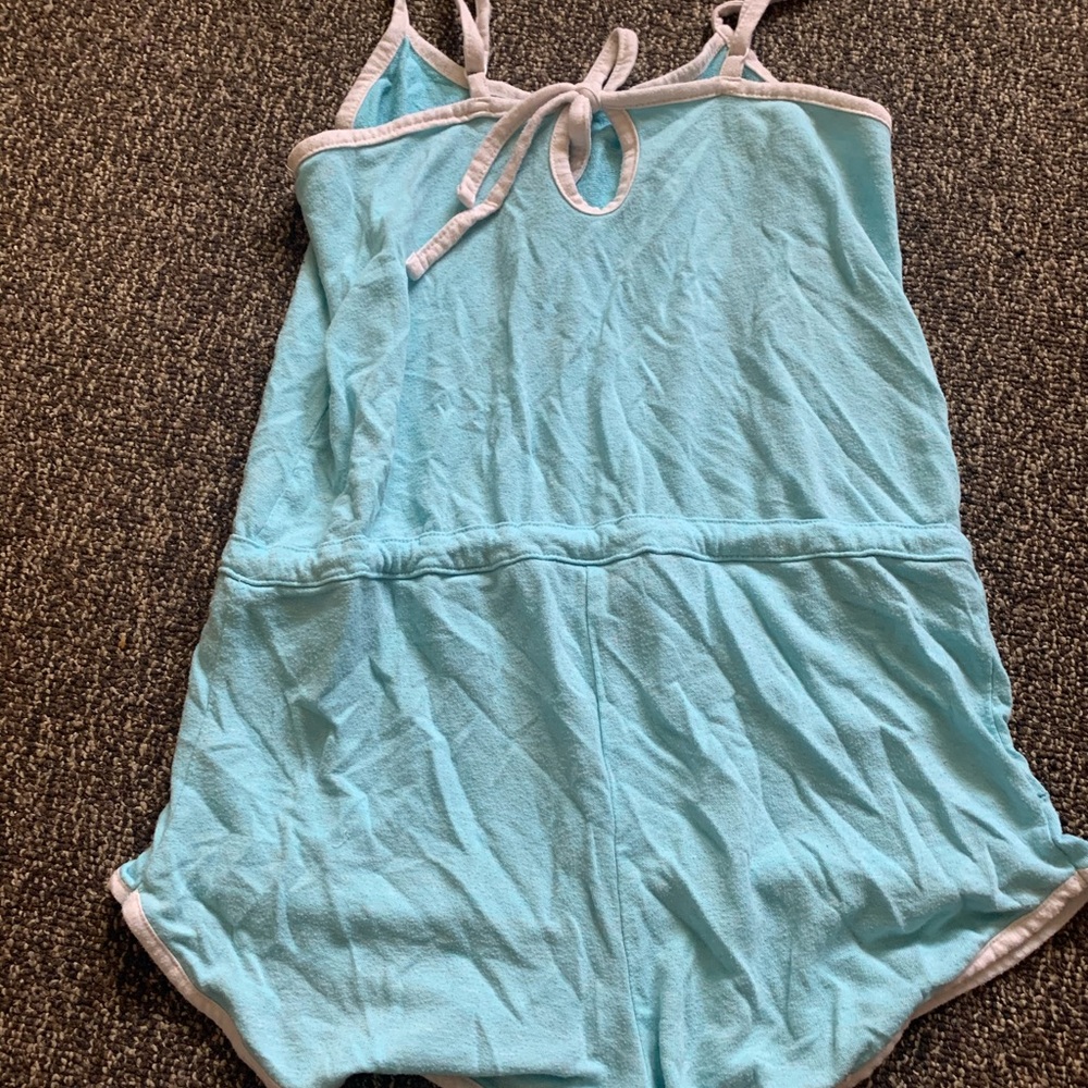 Light blue romper.